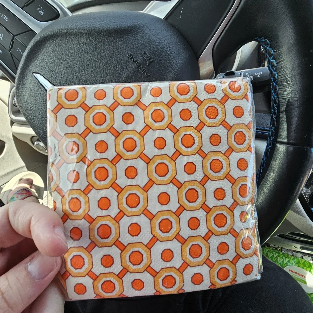 15 packs of various size napkins and themes